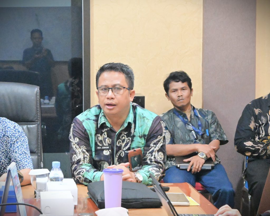 Karo AUPKK UIN Antasari Dr. H. Moh. Junaidin, M.A. saat menyampaikan laporan (Foto:Zulkifli Ariyadi)